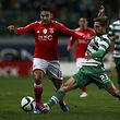 Sporting's player Adrien Silva (R) vies for the ball against Salvio of  Benfica during their Portuguese First League soccer match held at Alvalade Stadium in Lisbon, Portugal, 08 February 2015. JOSE SENA GOULAO/LUSA
