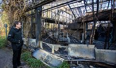 Wolfgang Dressen, manager of the Krefeld zoo, stands in front of the burned-out monkey house of the zoo in Krefeld, western Germany, on January 1, 2020. - Fire ripped through the monkey house at Krefeld zoo on New Year's Eve, killing dozens of animals, including orangutans, chimpanzees and marmosets, the management said. (Photo by Christoph Reichwein / dpa / AFP) / Germany OUT