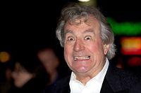 (FILES) In this file photo taken on October 16, 2012, British actor Terry Jones poses on the red carpet as he arrives to attend the premiere of the film 'A Liar's Autobiography' during the 56th BFI London Film Festival in London. - Monty Python star Terry Jones has died at the age of 77, his family said in a statement on January 22, 2020.  He fought a long battle with a rare form of dementia. "His work with Monty Python, his books, films, television programmes, poems and other work will live on forever -- a fitting legacy to a true polymath," they said. (Photo by ANDREW COWIE / AFP)