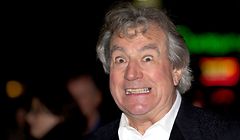 (FILES) In this file photo taken on October 16, 2012, British actor Terry Jones poses on the red carpet as he arrives to attend the premiere of the film 'A Liar's Autobiography' during the 56th BFI London Film Festival in London. - Monty Python star Terry Jones has died at the age of 77, his family said in a statement on January 22, 2020.  He fought a long battle with a rare form of dementia. "His work with Monty Python, his books, films, television programmes, poems and other work will live on forever -- a fitting legacy to a true polymath," they said. (Photo by ANDREW COWIE / AFP)