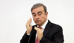 Former Renault-Nissan boss Carlos Ghosn wipes his face with a tissue as he addresses a large crowd of journalists on his reasons for dodging trial in Japan, where he is accused of financial misconduct, at the Lebanese Press Syndicate in Beirut on January 8, 2020. - The 65-year-old fugitive auto tycoon vowed to clear his name as he made his first public appearance at a news conference in Beirut since skipping bail in Japan. Ghosn, who denies any wrongdoing, fled charges of financial misconduct including allegedly under-reporting his compensation to the tune of $85 million. (Photo by JOSEPH EID / AFP)