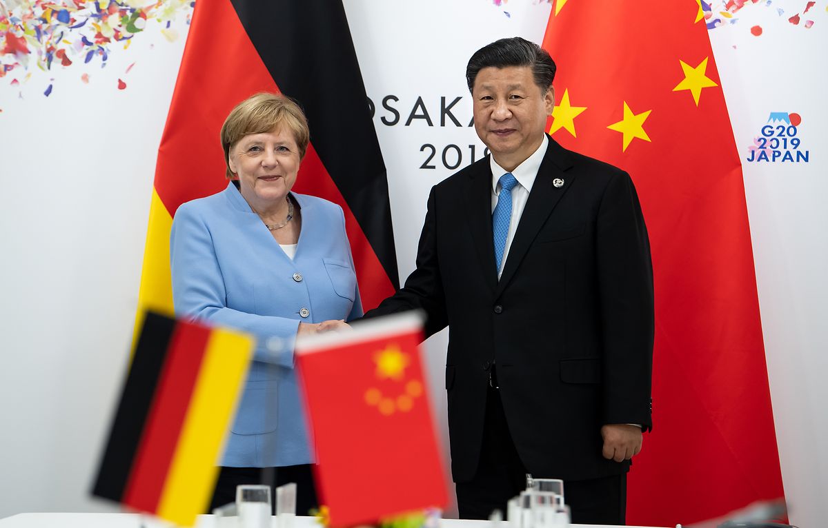 Der chinesische Präsident Xi Jinping bei seinem Treffen mit Bundeskanzlerin Angela Merkel im Rahmen des G20 Gipfels in Osaka, Japan.