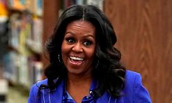Former US first lady Michelle Obama attends a roundtable discussion at Whitney M. Young Magnet High School in Chicago, November 12, 2018. - Former US first lady Michelle Obama's book, "Becoming," hits stores on Tuesday. Obama, 54, will head out on a multi-city arena tour to promote the memoir, with celebrity friends like Oprah Winfrey and Reese Witherspoon tapped to moderate the events. (Photo by JIM YOUNG / AFP)
