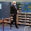 German President Frank-Walter Steinmeier leaves a voting booth after casting his ballot at a polling station in Berlin on Sunday