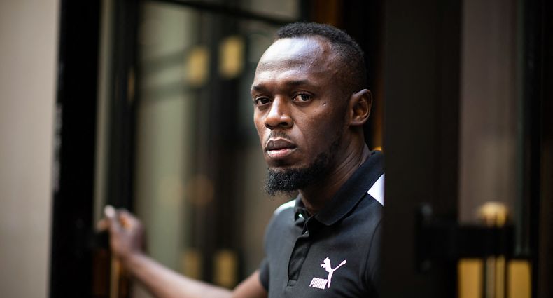 (FILES) In this file photo taken on May 15, 2019, Jamaican Olympic sprinter Usain Bolt poses during a photo session as he launches a new brand of electric scooters named "Bolt" in Paris. - The investigation into a multi-million dollar fraud at the Kingston-based investment firm Stocks and Securities Limited (SSL), which has reportedly seen Bolt's $12 million account left almost empty, is dominating discussion in the Caribbean nation. (Photo by Martin BUREAU / AFP)