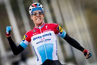 Luxembourg's  Bob Jungels of Deceuninck - Quick-Step celebrates as he crosses the finish line to win the 71st edition of the Kuurne-Brussels-Kuurne one day cycling race, 200,1 km from Kuurne to Kuurne via Brussels on March 3, 2019, in Kuurne. (Photo by JASPER JACOBS / Belga / AFP) / Belgium OUT