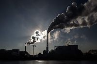 Smoke rises from the chimneys of a waste incineration plant in Saint-Ouen on the outskirts of the French capital Paris, on December 12, 2018. (Photo by Philippe LOPEZ / AFP)