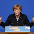 German Chancellor and leader of the Christian Democratic Union (CDU) Angela Merkel delivers her speech during the CDU party congress in Karlsruhe, Germany December 14, 2015.  REUTERS/Ralph Orlowski 