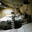 A picture taken on March 25, 2020 shows an emergency tent at the military field hospital outside the Emile Muller Hospital in Mulhouse, eastern France, on the ninth day of a lockdown aimed at curbing the spread of the COVID-19 (novel coronavirus) in France. (Photo by Mathieu CUGNOT / POOL / AFP)