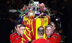 TOPSHOT - The coffin of Britain's Queen Elizabeth II is carried out of the Westminster Abbey in London on September 19, 2022, during the State Funeral Service. (Photo by HANNAH MCKAY / POOL / AFP)