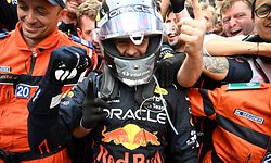 Red Bull Racing's Mexican driver Sergio Perez celebrates in the parc ferme after winning the Monaco Formula 1 Grand Prix at the Monaco street circuit in Monaco, on May 29, 2022. (Photo by CHRISTIAN BRUNA / POOL / AFP)