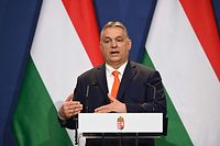 Hungarian Prime Minister Viktor Orban addresses a press conference after talks with his Polish counterpart and Italian politician Salvini in Budapest on April 1, 2021. - Fresh from his party's exit out of the centre-right European People's Party (EPP), nationalist Hungarian Prime Minister Viktor Orban on April 1, 2021 welcomed Polish and Italian populists as he explores new alliances. (Photo by Attila KISBENEDEK / AFP)