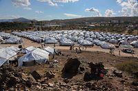 A picture taken on October 14, 2020 shows the Kara Tepe camp for refugees and migrants on the island of Lesbos. - Greece will build a new permanent camp on the island of Lesbos next year to replace the facility that burned down last month, the migration minister said October 12, 2020. (Photo by Manolis LAGOUTARIS / AFP)