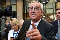 Outgoing European Commission president Jean-Claude Juncker gestures as he addresses the media after the EU leaders struck a deal on the bloc's top jobs during the third day of a EU summit, in Brussels on July 2, 2019. - EU leaders on July 2 neared a hard-fought summit compromise to put women in two of the bloc's most important jobs for the first time. After three days of bitter wrangling, German Defence Minister Ursula von der Leyen emerged as a serious candidate to replace Jean-Claude Juncker at the head of the European Commission. (Photo by Bertrand GUAY / AFP)