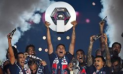 (FILES) In this file photo taken on May 18, 2019, Paris Saint-Germain's Brazilian defender Thiago Silva celebrates with the champion's trophy at the end of the French L1 football match between Paris Saint-Germain (PSG) and Dijon at the Parc des Princes stadium in Paris. - The football season in France has been declared over following a league vote on April 30, 2020, with Paris Saint-Germain being named as champions. PSG topped the Ligue 1 table by 12 points from Marseille when the season was suspended in mid-March because of the coronavirus outbreak, which has gone on to kill more than 24,000 people in France. (Photo by FRANCK FIFE / AFP)