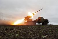 TOPSHOT - A BM-21 'Grad' multiple rocket launcher fires towards Russian positions on the front line near Bakhmut, Donetsk region, on November 27, 2022, amid the Russian invasion of Ukraine. (Photo by Anatolii STEPANOV / AFP)