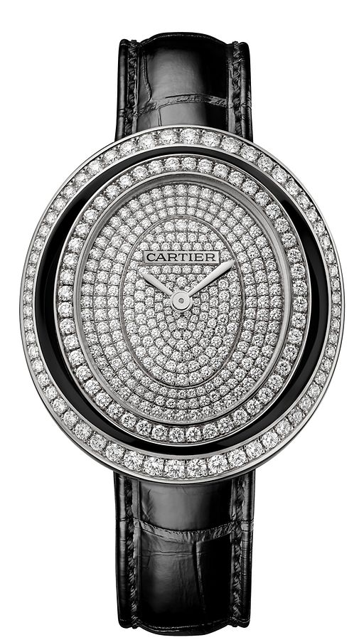 Optische Illusion: Das neue Uhrenmodell „Hypnose“ von Cartier besticht mit Diamantpavé auf Zifferblatt und Lünette, schwarzem Lack und einem Design, das dank Ovalen auf unterschiedlich hohen Ebenen, die hypnotische Wirkung einer Endlosspirale erzielt.