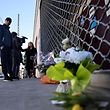 People and the press gather at the place where a 15-year-old boy was shot and killed the day before by a person who fled on a scooter with an accomplice, in Bondy, in Seine-Saint-Denis, a northeastern suburbs of Paris on February 27, 2021. - The shooting came days after police reinforcements deployed in two Paris suburbs to try break a cycle of gang violence after two 14-year-olds were stabbed to death in separate brawls. The two killings took place within less than 24 hours in the Essonne department south of Paris (Photo by THOMAS COEX / AFP)