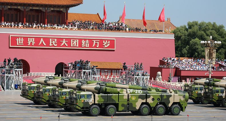 BEIJING, CHINA - SEPTEMBER 03: (CHINA OUT) Military vehicles carrying DF-21D anti-ship ballistic missiles drive past Tiananmen Gate during a military parade to mark the 70th anniversary of the victory of the Chinese People's War of Resistance Against Japanese Aggression and the World Anti-Fascist War at Tiananmen Square on September 3, 2015 in Beijing, China. China is marking the 70th anniversary of the end of World War II and its role in defeating Japan with a new national holiday and a military parade in Beijing. (Photo by VCG/VCG via Getty Images)
