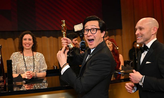 US-Vietnamese actor Ke Huy Quan (C), winner of the Oscar for Best Actor in a Supporting Role for "Everything Everywhere All at Once"