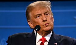 TOPSHOT - US President Donald Trump looks on during the final presidential debate at Belmont University in Nashville, Tennessee, on October 22, 2020. (Photo by JIM WATSON / AFP)