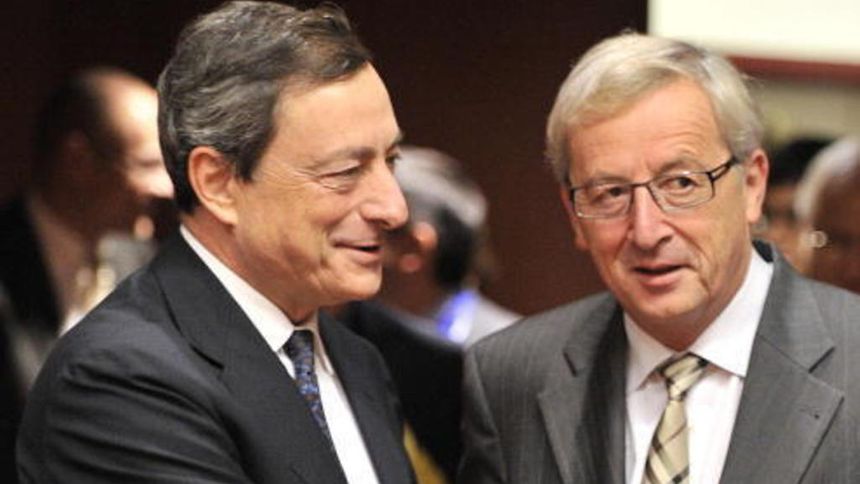 2011 file photo of European Central Bank president Mario Draghi with then Luxembourg Prime Minister and Eurogroup president Jean-Claude Juncker