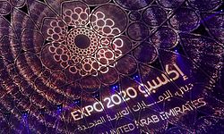 A logo of the Dubai Expo 2020 is projected during the opening ceremony, on September 30, 2021. - Dubai opened its extravagant Expo 2020 with a flashy opening ceremony of fireworks and lights displays as it attempts to woo the world despite the pandemic. (Photo by Giuseppe CACACE / AFP)
