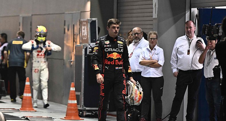 Red Bull Racing's Dutch driver Max Verstappen leaves after the Formula One Singapore Grand Prix night race at the Marina Bay Street Circuit in Singapore on October 2, 2022. (Photo by Lillian SUWANRUMPHA / AFP)