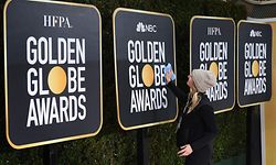 (FILES) In this file photo taken on January 5, 2019, workers and staff prepare the red carpet area for the 76th Golden Globe Awards in Beverly Hills, California. - Hollywood's biggest stars gather on January 5, 2020, for the glitzy Golden Globes, the first major awards show of a packed season that looks set to mark Netflix's coming-of-age in Tinseltown. The celebrity-filled gala in Beverly Hills is billed as the most raucous event in the showbiz calendar, where success helps create buzz ahead of next month's Oscars. (Photo by Mark RALSTON / AFP)