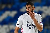 Real Madrid's French forward Karim Benzema reacts at the end of the UEFA Champions League group B football match between Real Madrid and Shakhtar Donetsk at the Alfredo di Stefano stadium in Valdebebas on the outskirts of Madrid on October 21, 2020. (Photo by GABRIEL BOUYS / AFP)