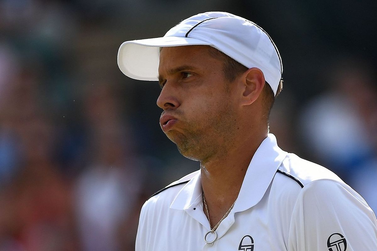 Luxembourg's Gilles Muller against Spain's Rafael Nadal during their men's singles fourth round match on the seventh day of the 2017 Wimbledon Championships 