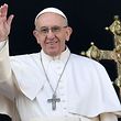 Pope Francis waves from the balcony of St Peter's basilica during the traditional "Urbi et Orbi" Christmas message to the city and the world, on December 25, 2016 at St Peter's square in Vatican.
Pope Francis offered his thoughts to victims of terrorism in his annual Christmas address, days after the truck attack that left 12 dead at a festive Berlin market. / AFP PHOTO / ANDREAS SOLARO