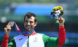 Bronze medallist Portugal's Fernando Pimenta celebrates on podium after the men's kayak single 1000m final during the Tokyo 2020 Olympic Games at Sea Forest Waterway in Tokyo on August 3, 2021. (Photo by Philip FONG / AFP)