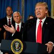 US President Donald Trump delivers a statement on healthcare in front of alleged "victims of Obamacare" at the White House in Washington on July 24, 2017. / AFP PHOTO / YURI GRIPAS