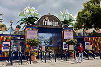A photo taken on July 14, 2022 shows the closed Tivoli Friheden amusement park, in Aarhus, western Denmark, after a 14-year-old girl was killed and a 13-year-old boy injured in a roller coaster accident. - The accident occurred shortly before 1:00 p.m. (11:00 GMT) when a trolley came off the "Cobra" attraction, the director of the Tivoli Friheden amusement park said. (Photo by Mikkel Berg Pedersen / Ritzau Scanpix / AFP) / Denmark OUT
