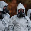 (FILES) In this file photo taken on March 10, 2018 Personnel in protective coveralls and breathing equiptment work at the Salisbury District Hospital in Salisbury, southern England, on March 10, 2018, in connection with the major incident sparked after a man and a woman were apparently poisoned in a nerve agent attack.
A British couple left critically ill in an English town were exposed to Novichok -- the same nerve agent used in the poisoning of a former Russian spy Sergei Skripal and his daughter Yulia Skripal in the nearby city of Salisbury this year, police said on July 5, 2018. / AFP PHOTO / Daniel LEAL-OLIVAS