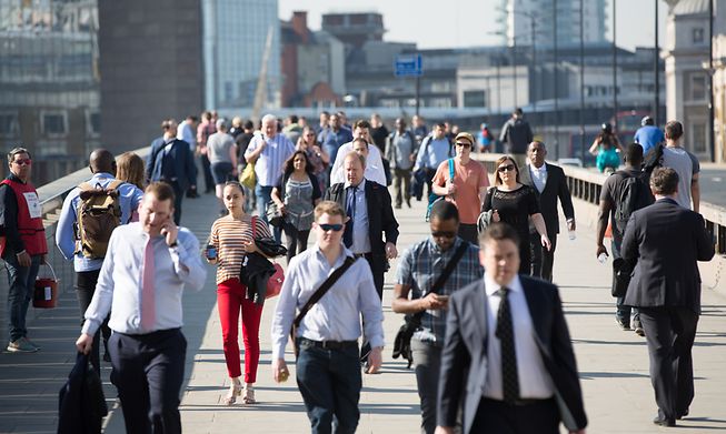 Office workers making their way to work in London