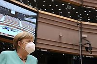 German Chancellor Angela Merkel wears a protective facemask as she attends a plenary session at The European Parliament in Brussels on July 8, 2020, upon the presention of the German programme for EU presidency. - The German presidency started on July 1, and will last until December 31, 2020. (Photo by YVES HERMAN / POOL / AFP)