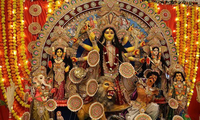 The many-armed Goddess Durga brought peace and prosperity to the universe, according to Hindu mythology
