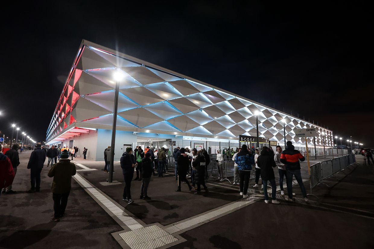 The stadium was also illuminated in national colors.