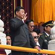 Chinese President Xi Jinping (L) waves next to former president Jiang Zemin (bottom R) during a military parade in Beijing on October 1, 2019, to mark the 70th anniversary of the founding of the People�s Republic of China. (Photo by Greg BAKER / AFP)
