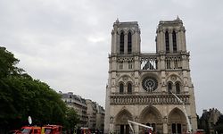 Firefighters secure Notre-Dame Cathedral in Paris on April 16, 2019, in the aftermath of a fire that caused its spire to crash to the ground. - Crowds of stunned Parisians and tourists -- some crying, others offering prayers -- watched in horror in central Paris on April 15 night as firefighters struggled for hours to extinguish the flames engulfing the Notre-Dame Cathedral. (Photo by Thomas SAMSON / AFP)