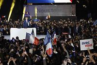 French President and La Republique en Marche (LREM) party candidate for re-election Emmanuel Macron celebrates after his victory in France's presidential election, at the Champ de Mars in Paris, on April 24, 2022. (Photo by Ludovic MARIN / AFP)