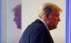 TOPSHOT - US President Donald Trump departs after speaking at the daily briefing on the novel coronavirus, which causes COVID-19, in the Brady Briefing Room at the White House on April 13, 2020, in Washington, DC. (Photo by MANDEL NGAN / AFP)