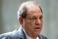 (FILES) In this file photo movie mogul Harvey Weinstein arrives at Manhattan Supreme Court for a new bail hearing, on December 6, 2019, in New York. - Disgraced movie producer Harvey Weinstein, who has been serving a 23-year prison sentence for sexual assault in New York since 2020, was on his way to Los Angeles on July 20, 2021 for a second trial in which he will face new charges. The 69-year-old left the Wende prison in upstate New York shortly before 9:30 am (1330 GMT) and was handed over "to the appropriate officials for transport to the state of California per a court order," a spokesman for the New York prison authorities said in a statement. (Photo by EDUARDO MUNOZ ALVAREZ / AFP)