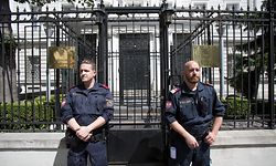 Austrian police stand guard in front of the Russian embassy during a protest of members and supporters of the Chechen community on July 07, 2020 in Vienna after the murder of Martin B. a vocal critic of the Chechen Republic's government. - Austrian police have arrested two Russians from Chechnya over the fatal shooting of a Chechen dissident, identified by Austrian prosecution as Martin B. The 43-year-old asylum seeker, was found dead with gunshot wounds near the capital Vienna on July 4, 2020. (Photo by ALEX HALADA / AFP)