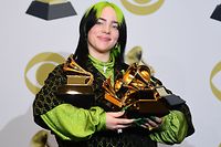 US singer-songwriter Billie Eilish poses in the press room with the awards for Album Of The Year, Record Of The Year, Best New Artist, Song Of The Year and Best Pop Vocal Album during the 62nd Annual Grammy Awards on January 26, 2020, in Los Angeles. (Photo by FREDERIC J. BROWN / AFP)