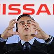 (FILES) This file photo taken on May 11, 2012 shows the-president and CEO of Japanese auto giant Nissan, Carlos Ghosn, gesturing as he answers questions during a press conference at their headquarters in Yokohama, suburban Tokyo. - Former Nissan boss Carlos Ghosn said on January 8, 2019 he had been "wrongly accused and unfairly detained" at a high-profile court hearing in Japan, his first appearance since his arrest in November rocked the business world. (Photo by TORU YAMANAKA / AFP)
