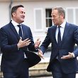 European Council President Donald Tusk (R) is welcomed by Luxembourg's Prime Minister Xavier Bettel prior to their meeting in Senningen on March 7, 2018. 
Tusk said EU does not want to "build a wall" with Britain as it leaves the bloc. "On the contrary the UK will be our closest neighbour and we want to remain friends and partners," Tusk told the press conference.
 / AFP PHOTO / EMMANUEL DUNAND