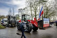 Members and supporters of the Farmers Defense Force (FDF) demonstrate against the government's nitrogen policy in the Zuiderpark in The Hague, the Netherlands, on March 11, 2023. (Photo by Robin UTRECHT / ANP / AFP) / Netherlands OUT